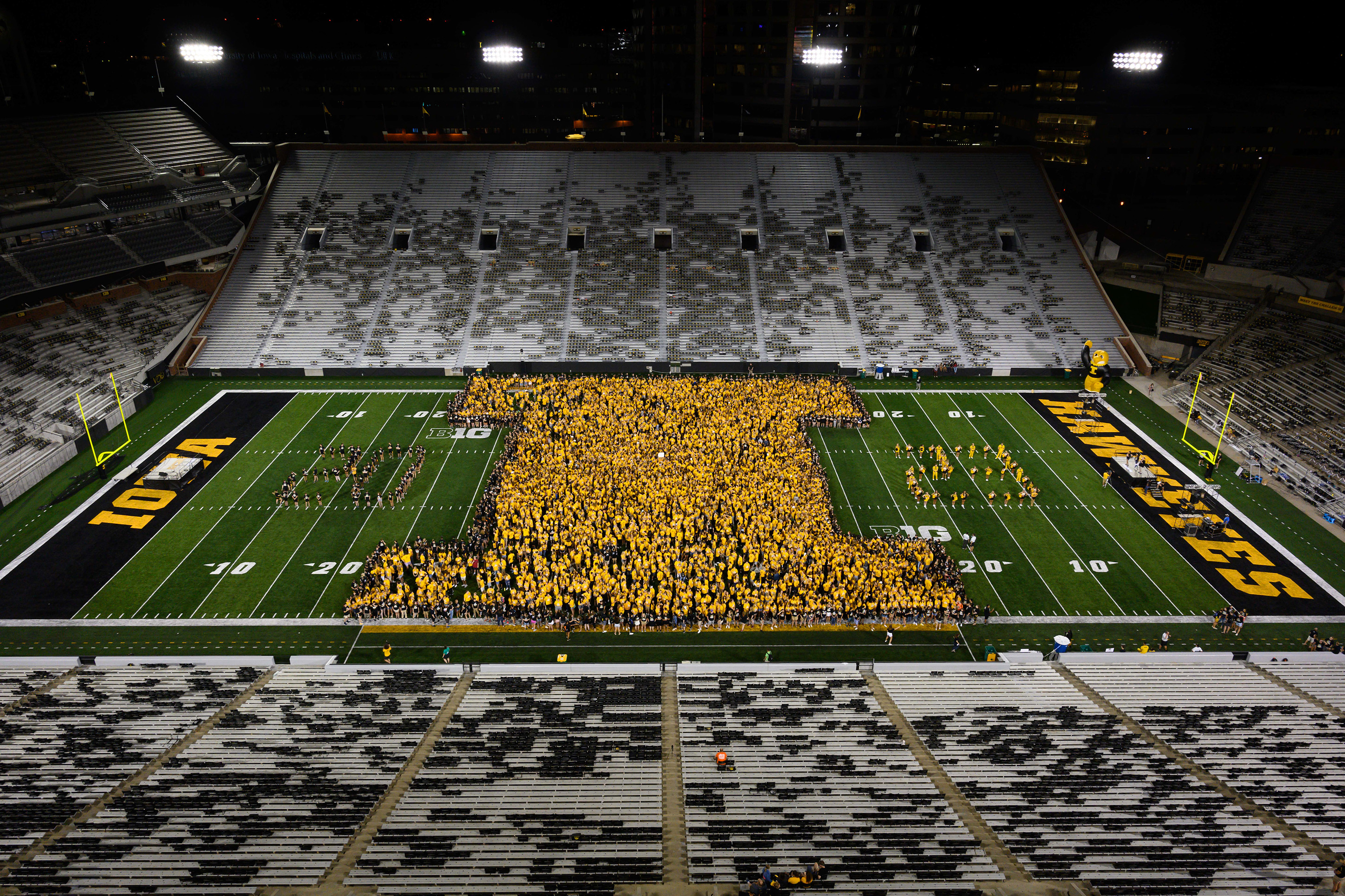 Iowa class of 2023 Photo on the feild at Kinnick